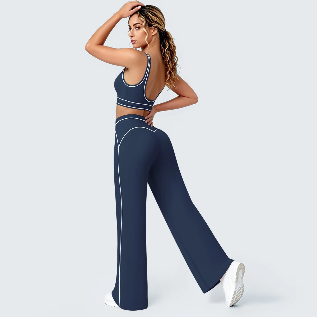 Damen Yoga-Set in Dunkelblau: Sport-BH mit Brustpolstern und weite Hose mit Kontrastkanten
