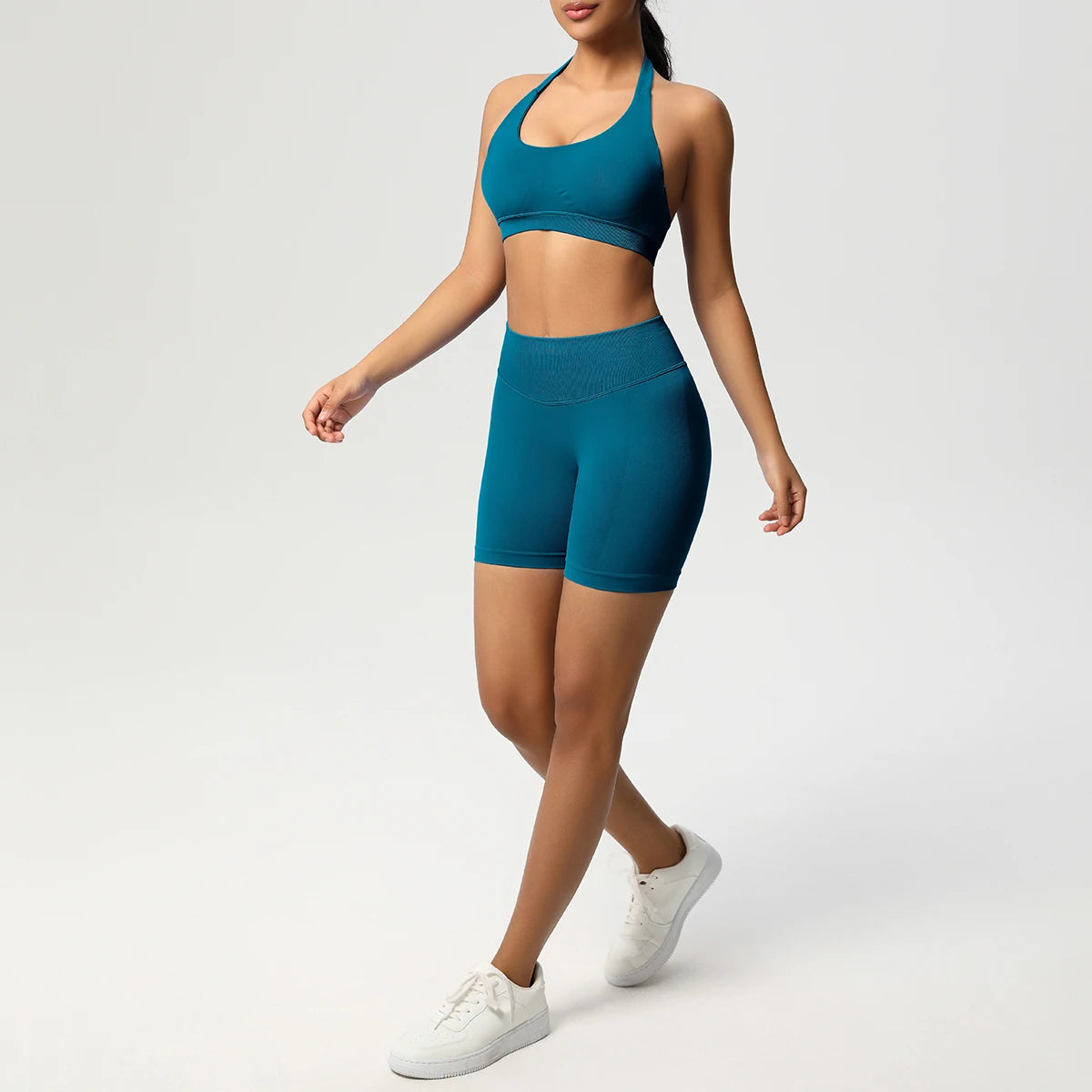 Nahtloses Fitnessset für Damen: Sport-BH und Laufshorts in Petrol, Set