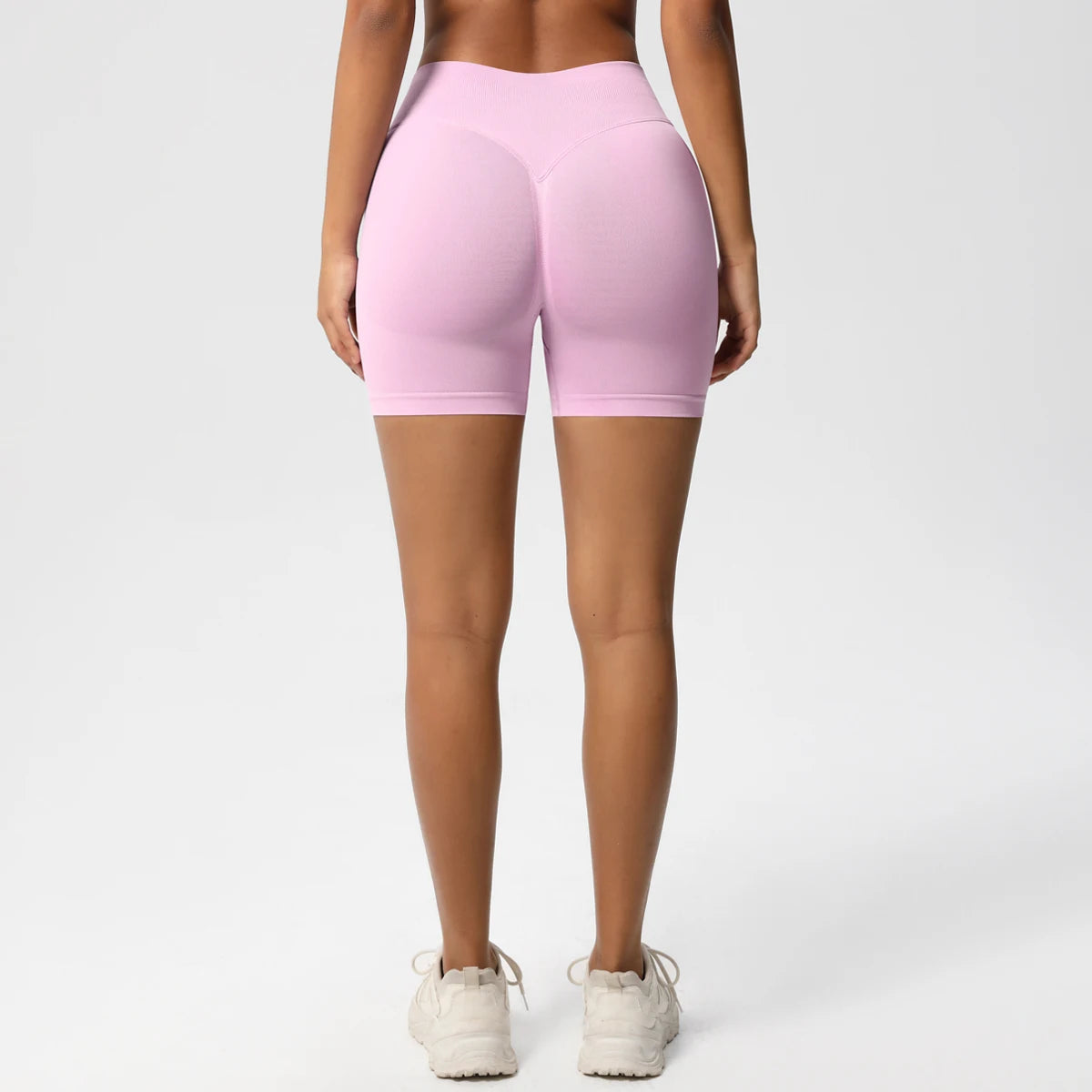 Damen-Yoga-Shorts High-Waist, rosa, Rückansicht mit figurbetonter Form