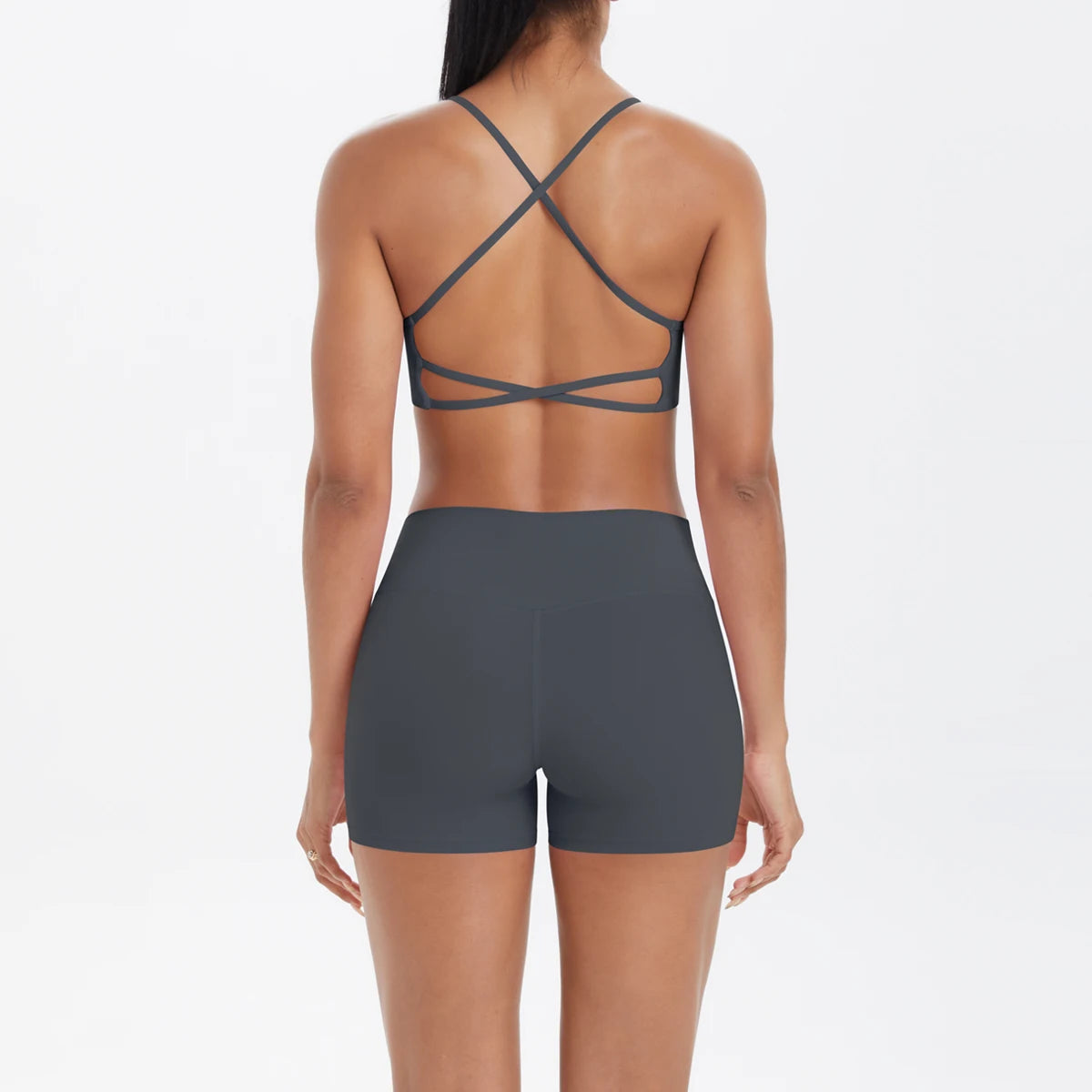 Damen Yoga-Set in Anthrazit mit Crossover-Top und High-Waist-Shorts, Rückansicht zentriert