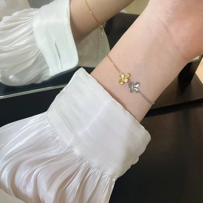 Damen-Kettenarmband mit Blumenanhänger aus Titanstahl