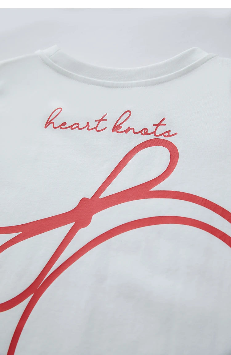 Damen T-Shirt aus ultraloch Stretch-Baumwolle mit Buchstaben-Bowknot-Aufdruck