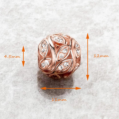 Roségoldener Charm, ca. 12×11 mm, 4,5 mm Höhe, mit funkelnden Steinen