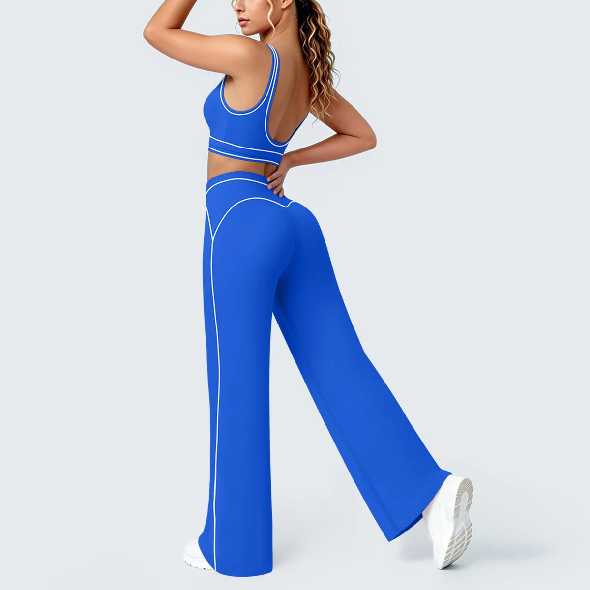 Damen Yoga-Set in Blau: Sport-BH mit Brustpolstern und weite Hose, Schrittansicht