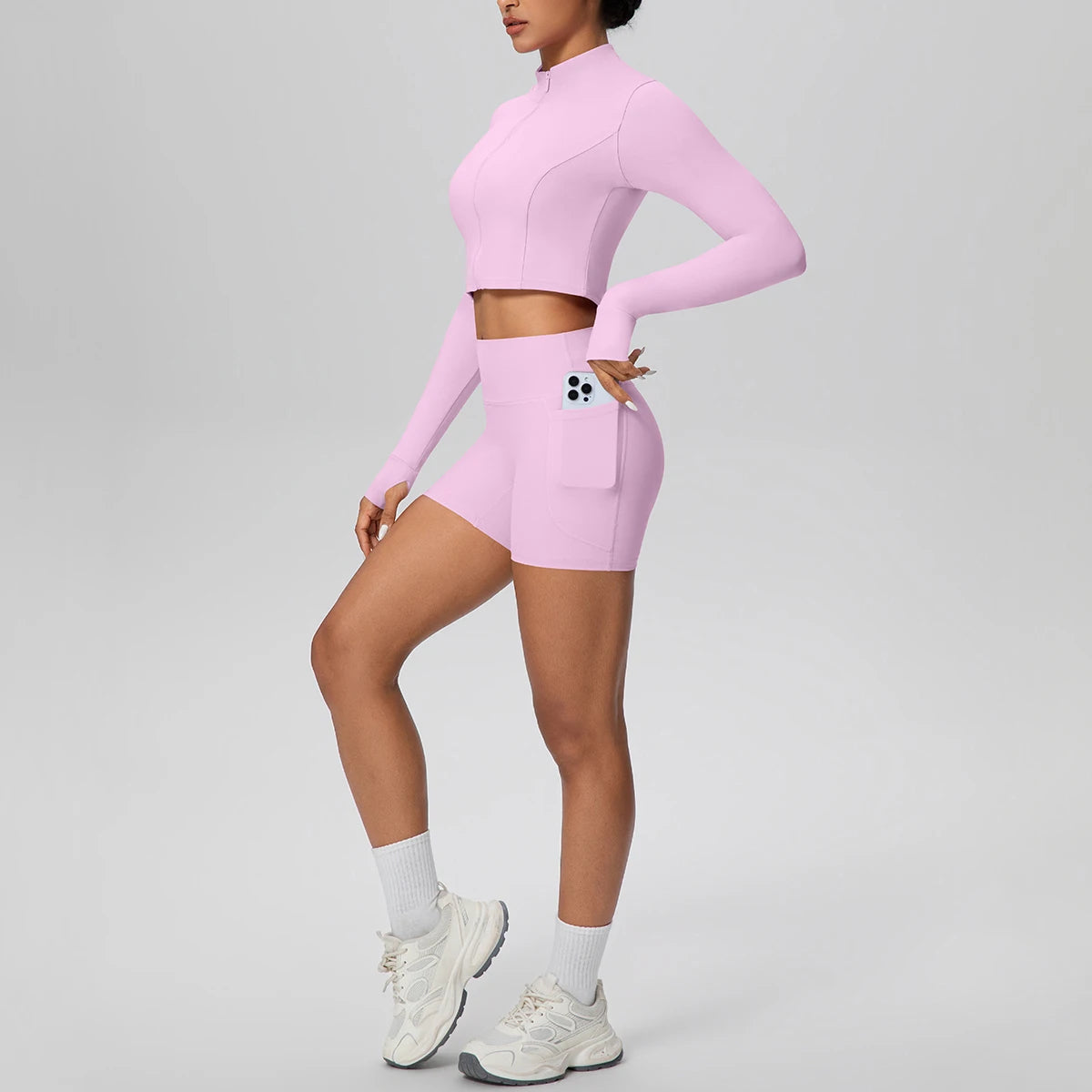 Damen-Yoga-Set hellrosa: kurzes Reißverschluss-Oberteil und High-Waist-Shorts