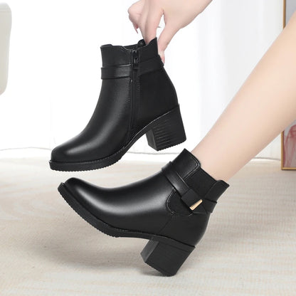 Damen-Winterstiefelette aus Leder, schwarz, seitlicher Reißverschluss, Blockabsatz, Profilsohle