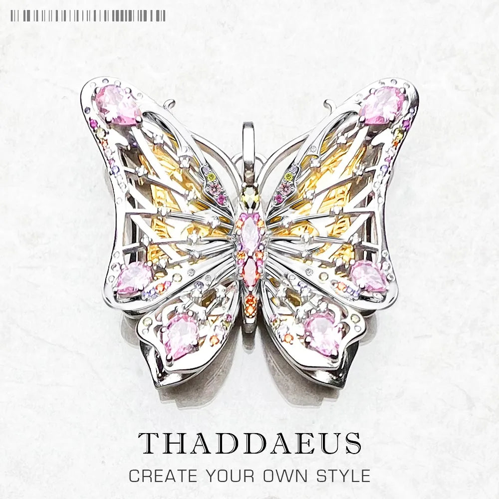 Schmuckanhänger Schmetterling aus Sterlingsilber mit rosa Steinen und goldfarbenen Akzenten