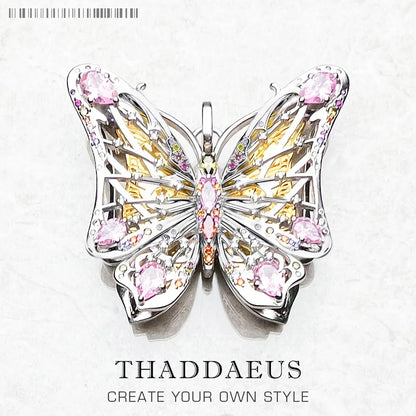 Schmuckanhänger Schmetterling aus Sterlingsilber mit rosa Steinen und goldfarbenen Akzenten
