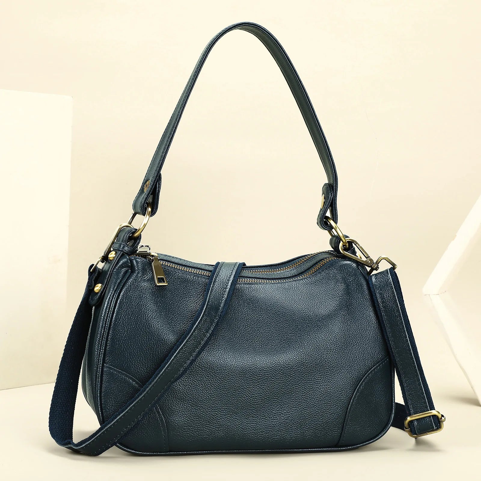 Damen-Schultertasche aus Leder, blau, halbmondförmig, zwei kurze Henkel und Schulterriemen