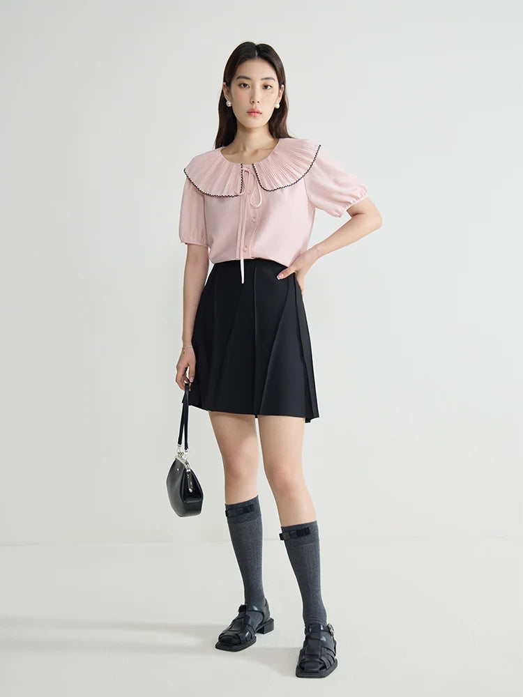 Elegante schwarze Bluse mit französischem Flair und figurformender Silhouette – Sommer-Textur für große Größen