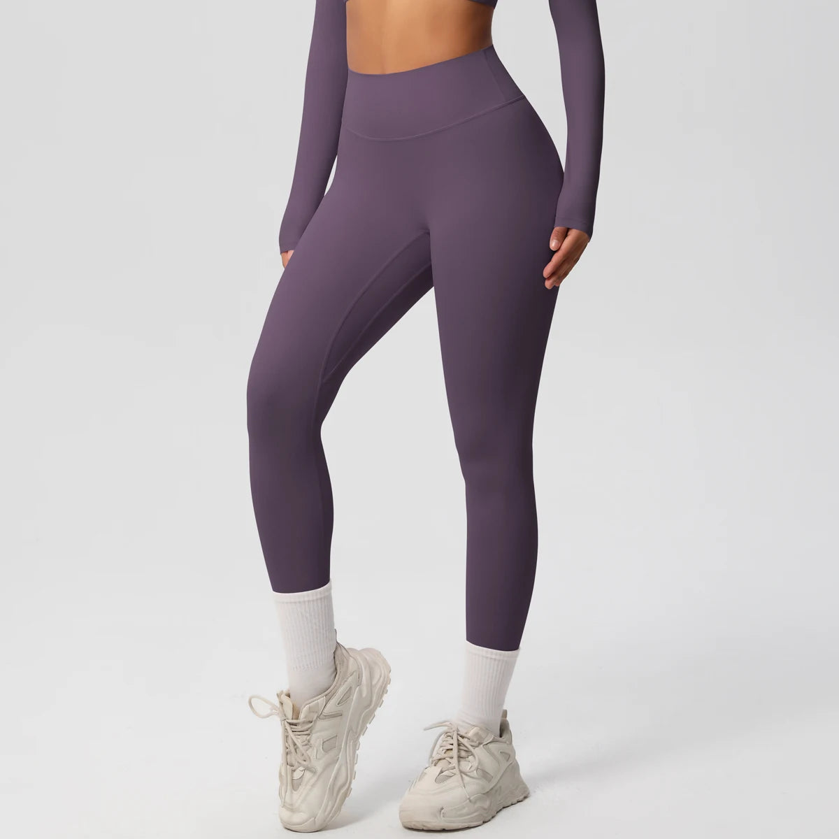 Damen-Yoga-Leggings in Lila mit hoher Taille und glatter Optik bis zum Knöchel