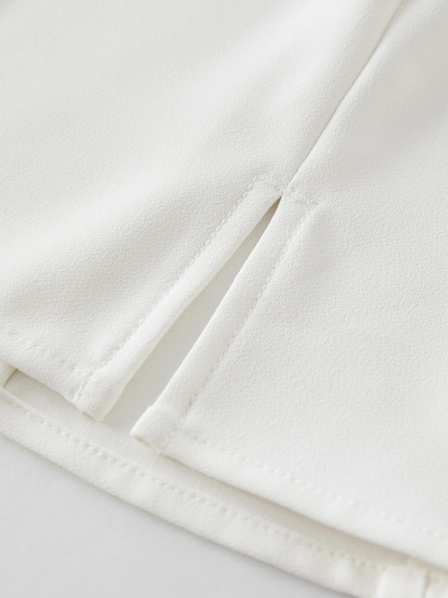 Kurzarm-Stricktop mit Puppenkragen für Damen in Plusgröße – modisch und elegant für den Sommer.
