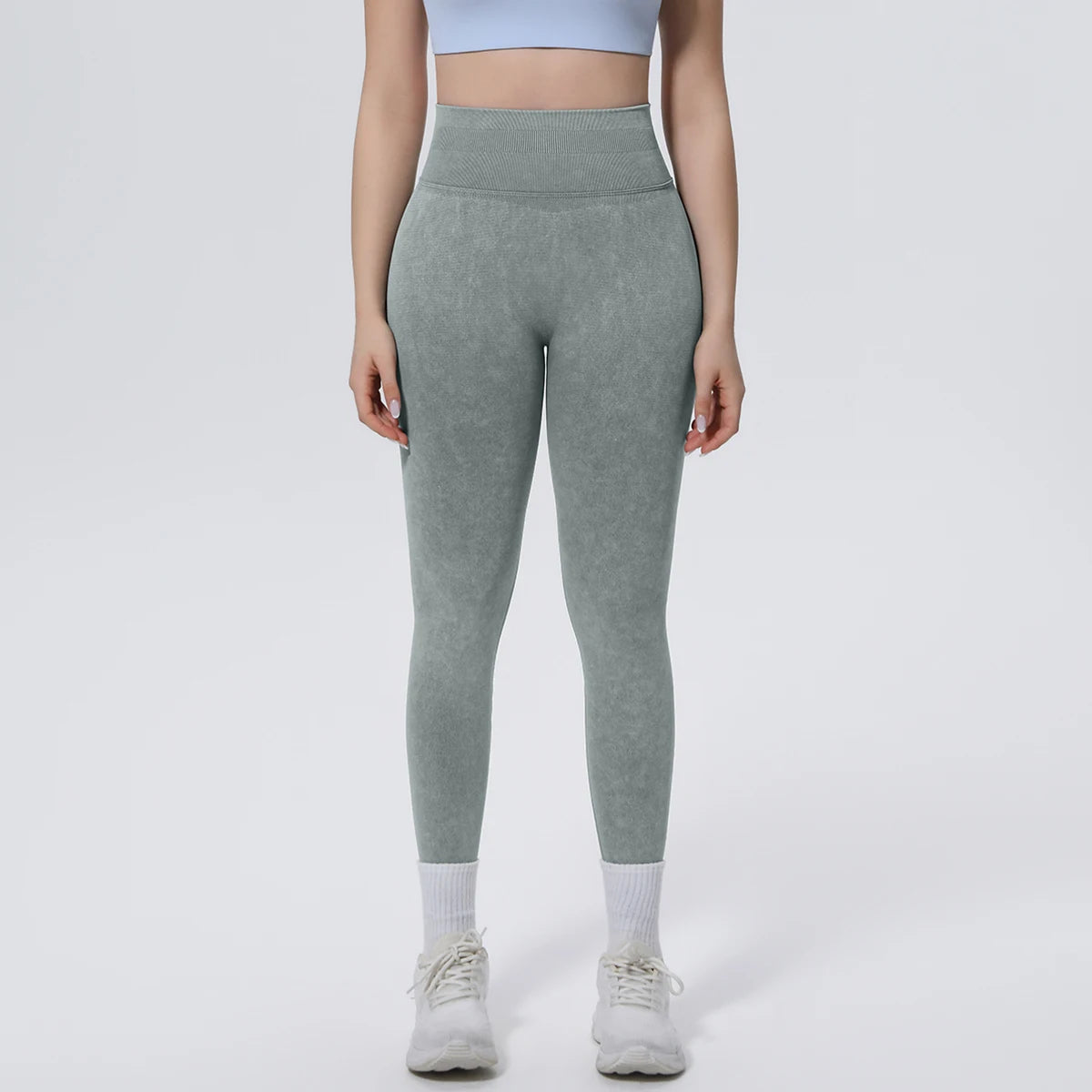 Nahtlose Yoga-Hose in Grau, vorne mit hohem Bund und körpernaher Form
