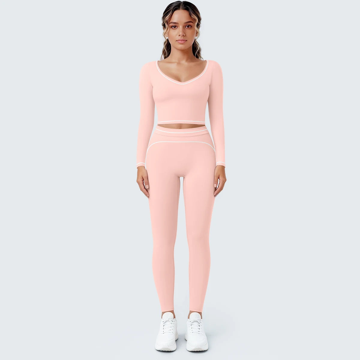 Damen-Yoga-Set hellrosa: Langarmshirt mit V-Ausschnitt und Leggings mit Cut-out-Bund
