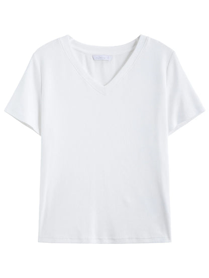 Elegantes Damen-Outfit in Plus-Size mit Shirt, Rock und Weste – ideal für den Urlaub im Frühling in Gelb