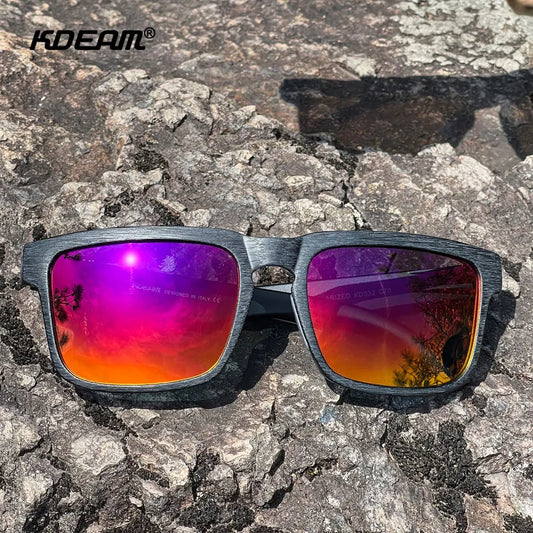Sonnenbrille mit lila-orange Farbverlauf-Linsen und dunklem Rahmen, polarisiert