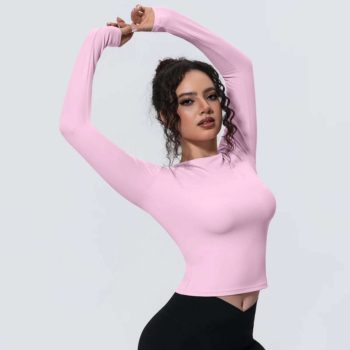 Atmungsaktives Yoga-Langarmshirt in Rosa, figurbetonter Sitz mit langen Ärmeln und Rundhals