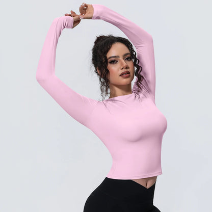 Atmungsaktives Yoga-Langarmshirt in Rosa, figurbetonter Sitz mit langen Ärmeln und Rundhals