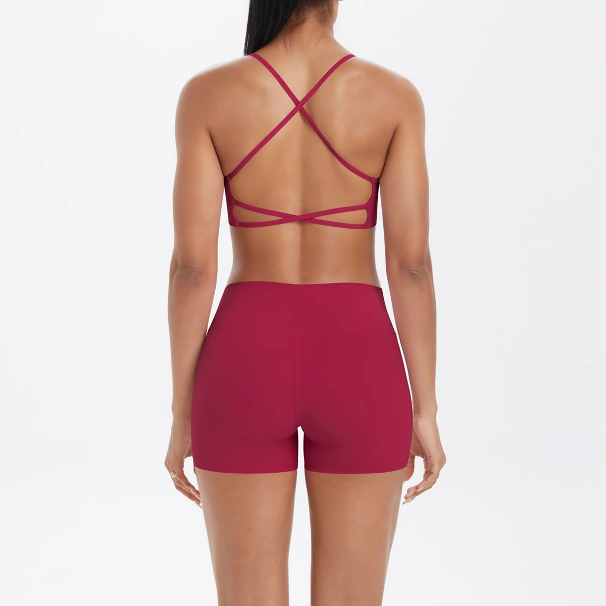 Bordeauxrotes Yoga-Set mit Crop-Top und Shorts, gekreuzter Rückenriemen-Optik