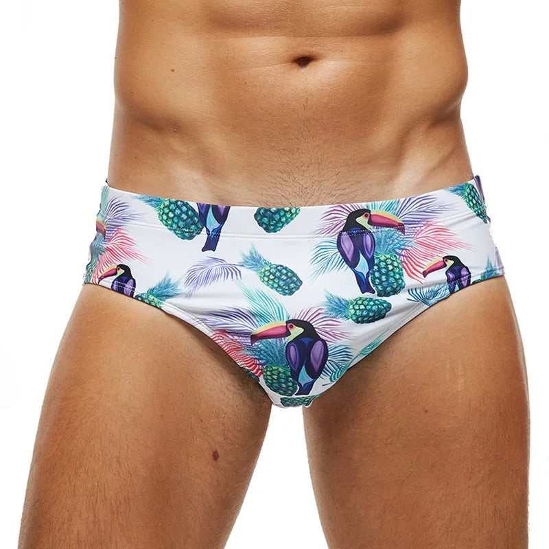 Badeshorts für Herren mit buntem Toukan- und tropischem Muster