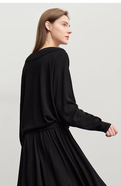 Schwarzer Strickpullover mit langen Ärmeln und gerafftem Bund für A-Linie