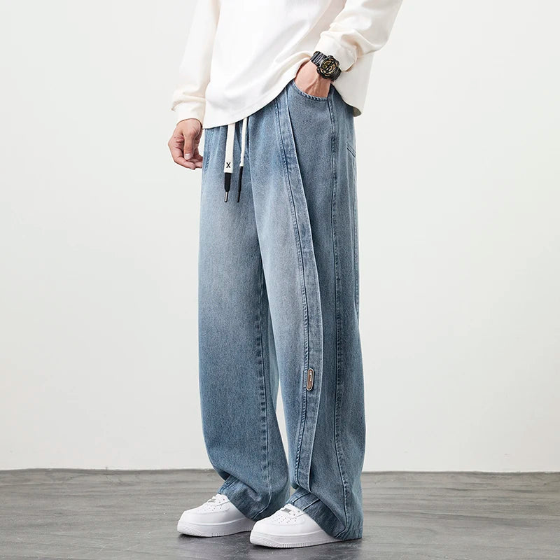 Herren Jeanshose mit brauner Stickerei im Hip Hop Stil