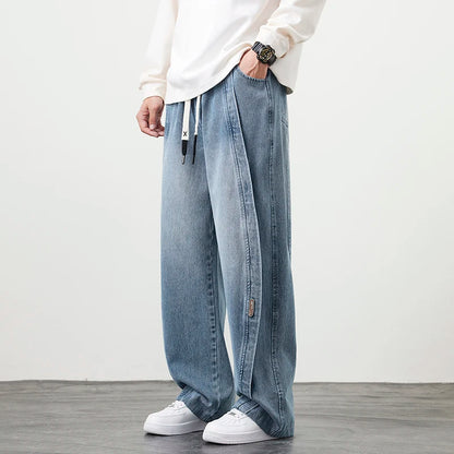 Herren Jeanshose mit brauner Stickerei im Hip Hop Stil