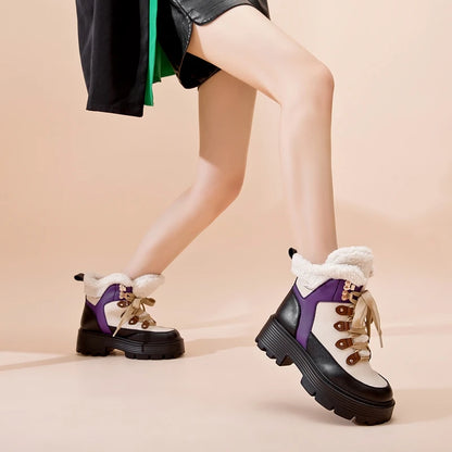 Damen-Schneestiefel mit Plateauabsatz und Schnürung, Kunstfell am Knöchel, violett/schwarz