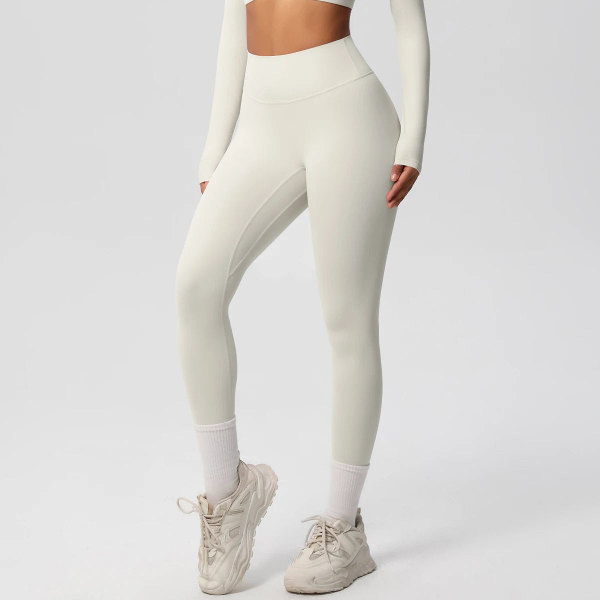 Damen-Yoga-Leggings in Cremeweiß mit hoher Taille, eng anliegend bis zum Knöchel