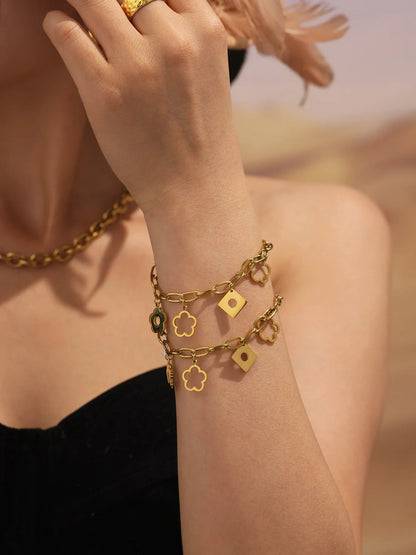 Damen-Charm-Armband mit Blumenmotiv aus Edelstahl
