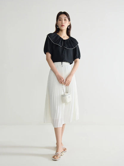 Elegante schwarze Bluse mit französischem Flair und figurformender Silhouette – Sommer-Textur für große Größen