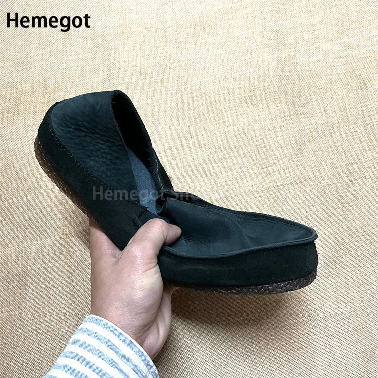 Herren-Slipper aus dunklem Leder mit Nahtkante und gepolsterter Innenöffnung