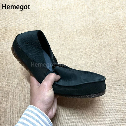 Herren-Slipper aus dunklem Leder mit Nahtkante und gepolsterter Innenöffnung