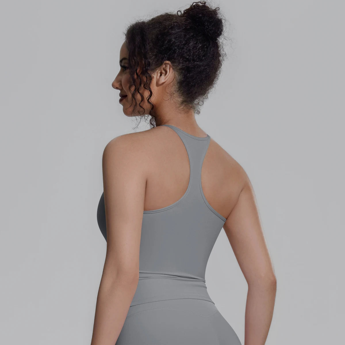 Damen-Sportweste mit Racerback, blau-grau, mit Brustpolster, Rückansicht
