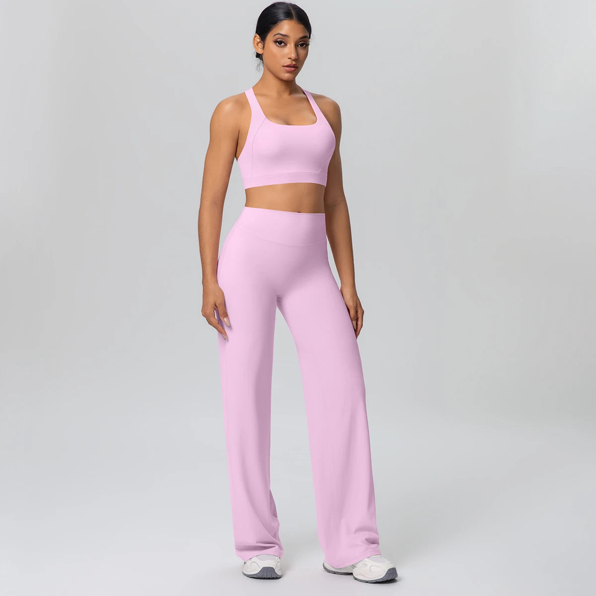 Athletik-Yoga-Set mit Brustpads in Lila: Sport-BH und weite Hose mit hoher Taille