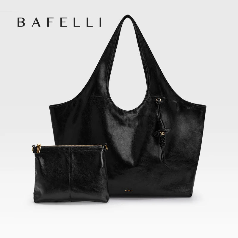 Schwarze Damen-Echtleder-Tragetasche mit Reißverschlussfach und passender kleiner Tasche