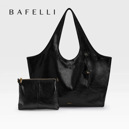 Schwarze Damen-Echtleder-Tragetasche mit Reißverschlussfach und passender kleiner Tasche