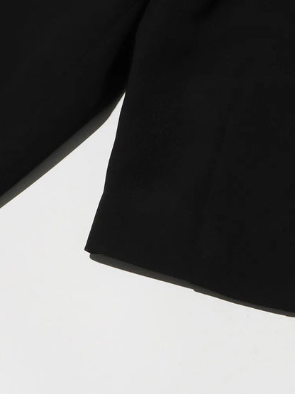 Eleganter Damen-Blazer mit Reverskragen und langen Ärmeln – Patchwork-Design und einreihiger Verschluss für einen lässigen Look.