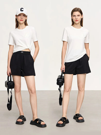Damen Top im minimalistischen Stil mit Bären-Applikation und O-Ausschnitt