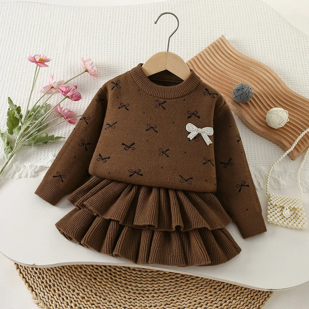 Mädchen Kleidungsset mit Bogen Druck Pullover und Faltenrock im 2-Teile Design