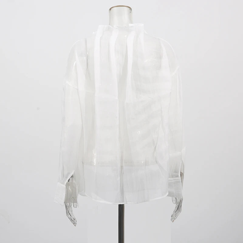 Lässige Damenbluse mit Spitzenbesatz und Patchwork-Design, langärmlig und mit Reverskragen – ideal für einen stilvollen Auftritt.