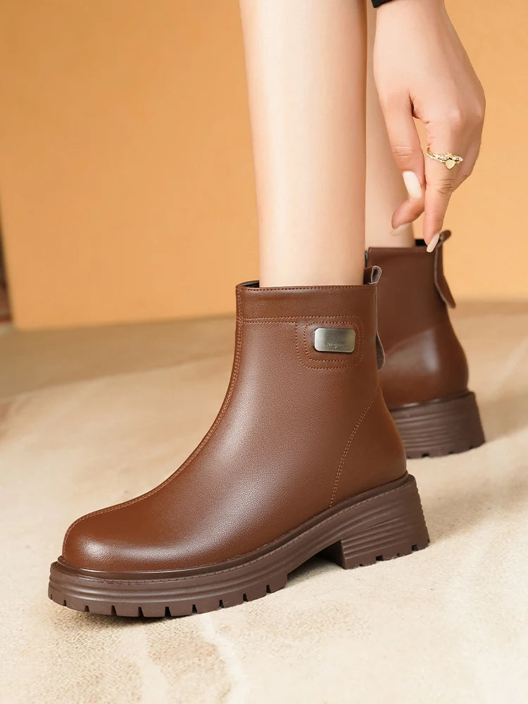 Braune Damen-Stiefelette aus Leder mit Wollfutter und breiter Profilsohle