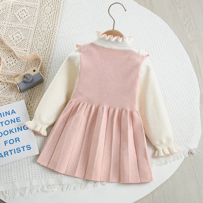 Mädchen Kleid aus gestricktem Material mit süßen gestickten Blumen und Farbblock