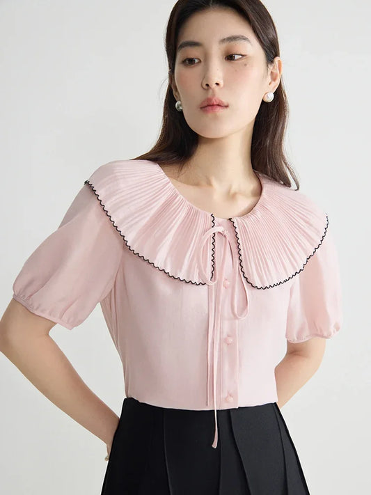 Elegante schwarze Bluse mit französischem Flair und figurformender Silhouette – Sommer-Textur für große Größen