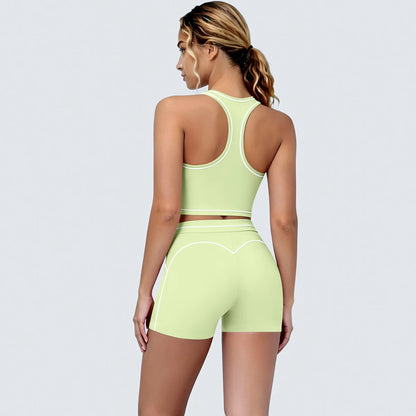Yoga-Set für Damen: Sport-BH und kurze Leggings, hellgrün mit Kontrastlinien.