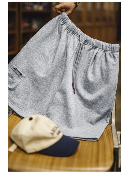 Herren Jogger-Shorts aus atmungsaktivem Material mit elastischer Taille und lockerer Passform