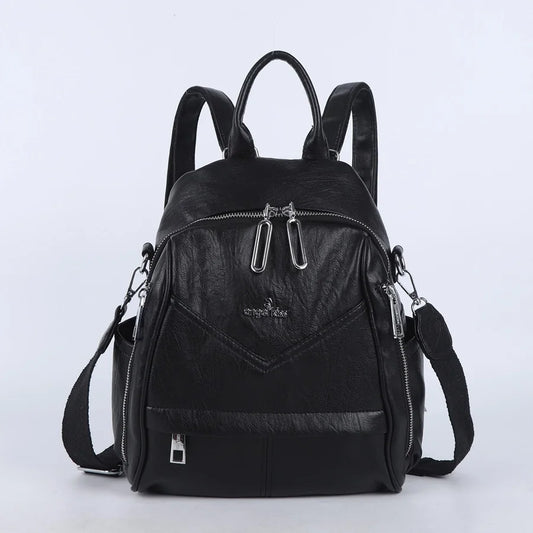 Schulrucksack aus Kunstleder in Schwarz mit mehreren Fächern und gepolsterten Trägern