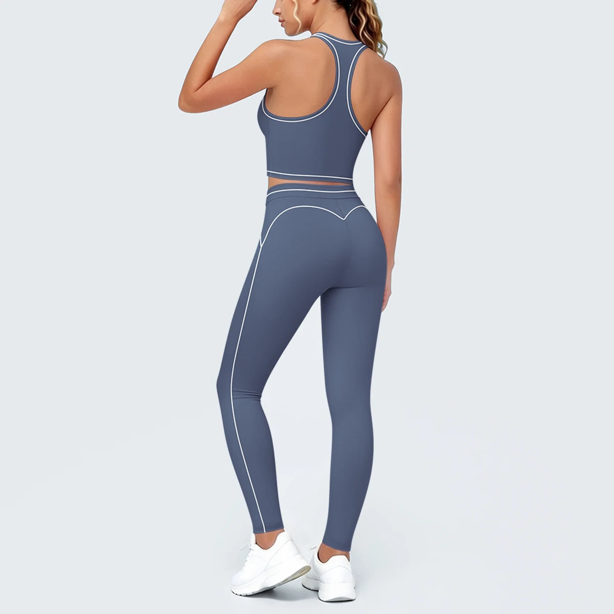 Rückenansicht Yoga-Set: Sport-Top und Leggings, blau-grau, kontrastierte Linien