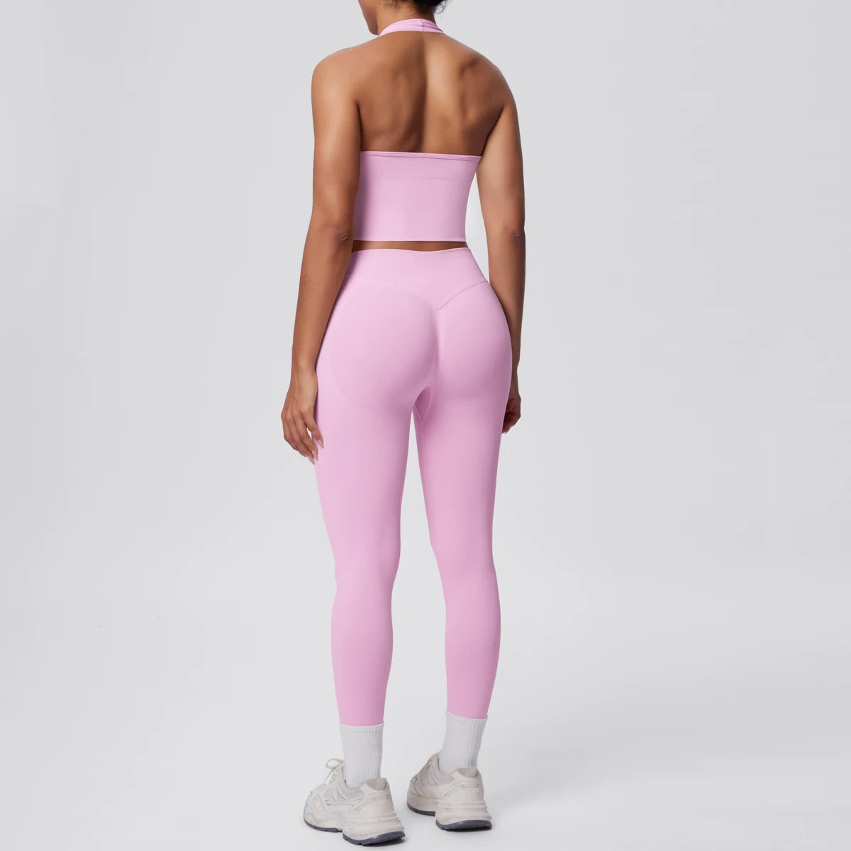 Yoga-Set für Frauen, Rückansicht: Sport-BH und Leggings, pfirsichrosa mit kurzem Bund.