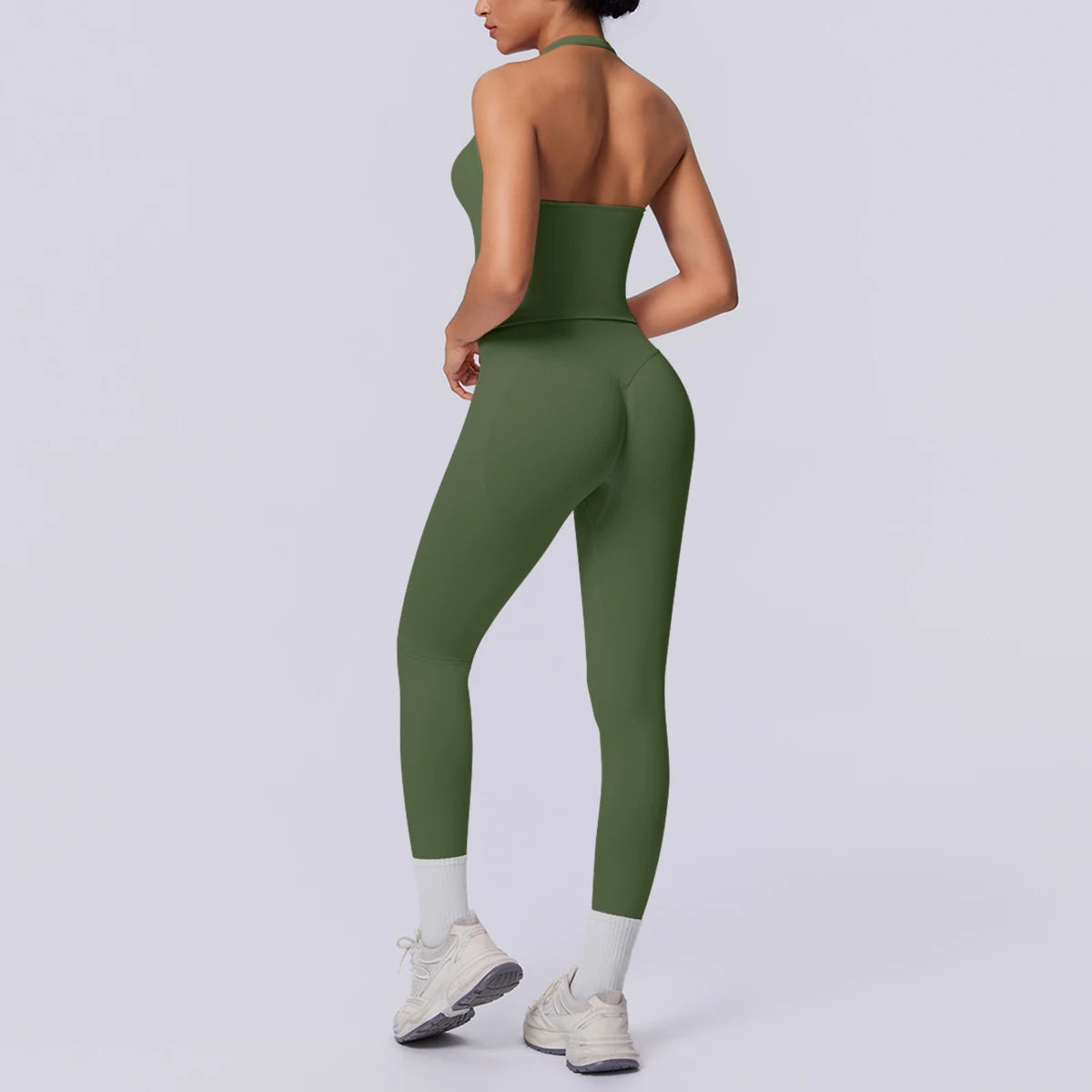 Nahtloses Yoga-Set in Olivgrün: Seitenansicht, Trägershirt und 7/8-Leggings.
